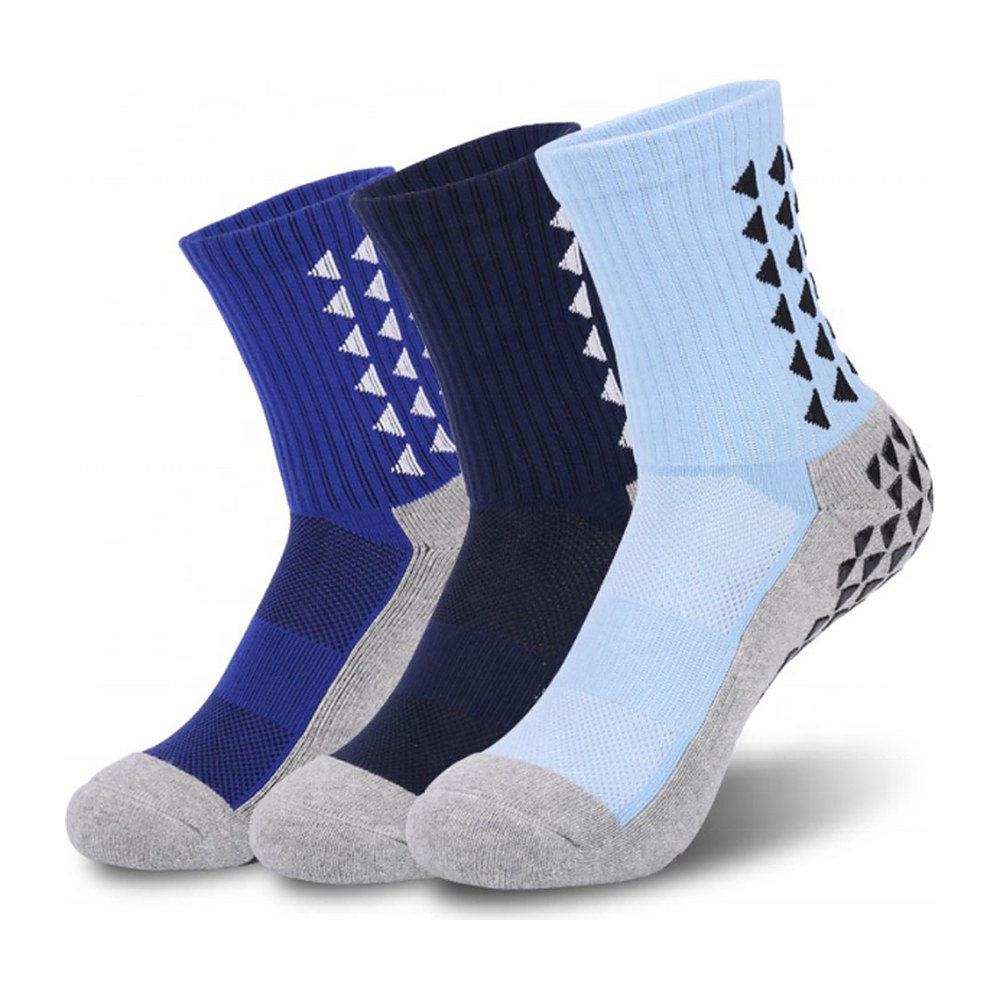 Blue crew grip socks with black silicone anti-slip pads on the sole and heel